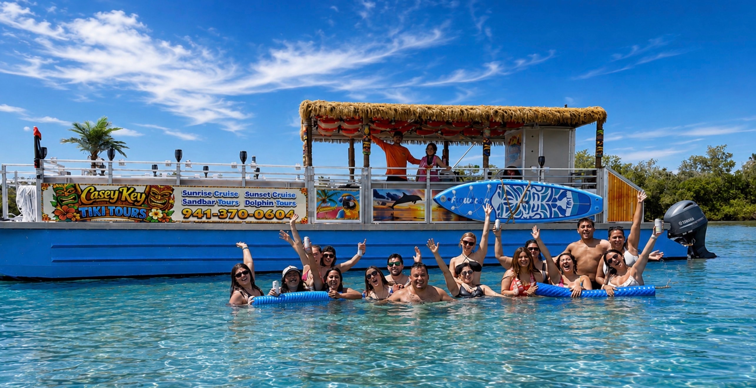 Group enjoying Siesta Key Tiki Tours at the sandbar